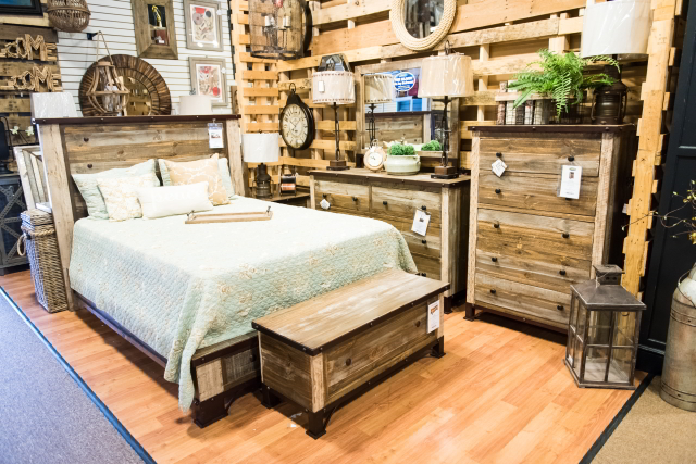 This rustic bedroom set offers plenty of storage options.