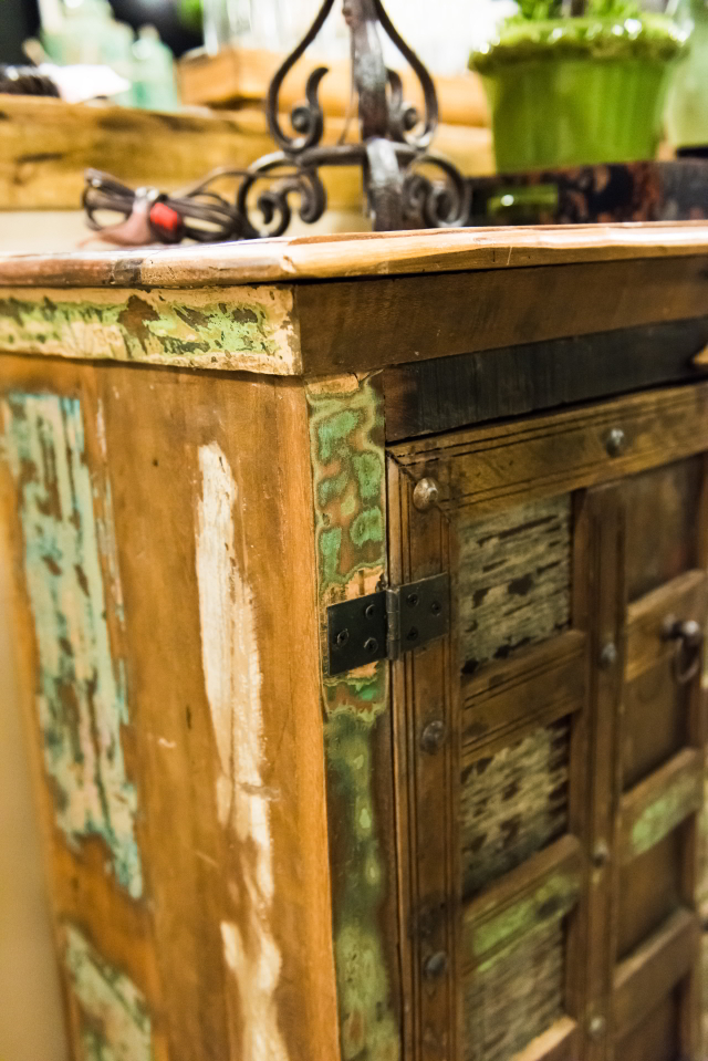 We love the distressed, one-of-a-kind finish on this rustic storage cabinet.