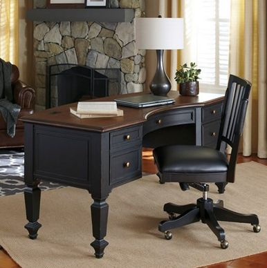 If you run a home-based business and have a dedicated home office, you might opt for a spacious desk with plenty of storage space built-in. One example we love is the Ravenwood Curved Desk, which offers 3 utility drawers for storing office supplies, plus a file drawer that can accommodate letter or legal sized paperwork.
