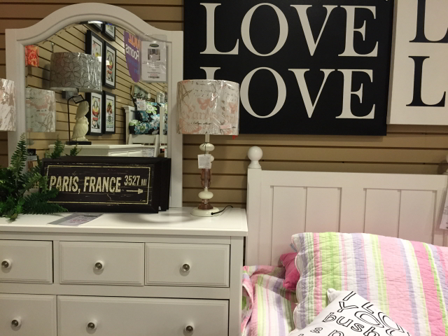 A nightstand and bedside lamp should be a no-brainer, but make the room even more inviting by adding a few best-sellers or classic literature or a few popular magazines.