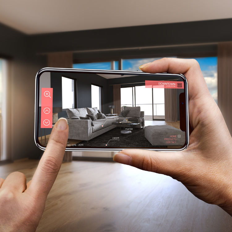 image of someone holding a smartphone and taking a picture of a living room with matching sofa and chair