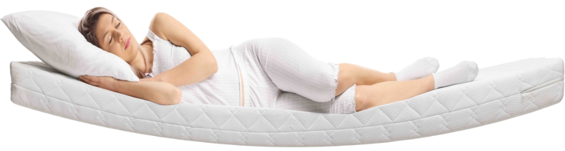 What Does the Comfort Life of a Mattress Mean? woman-on-curved-sagging-mattress